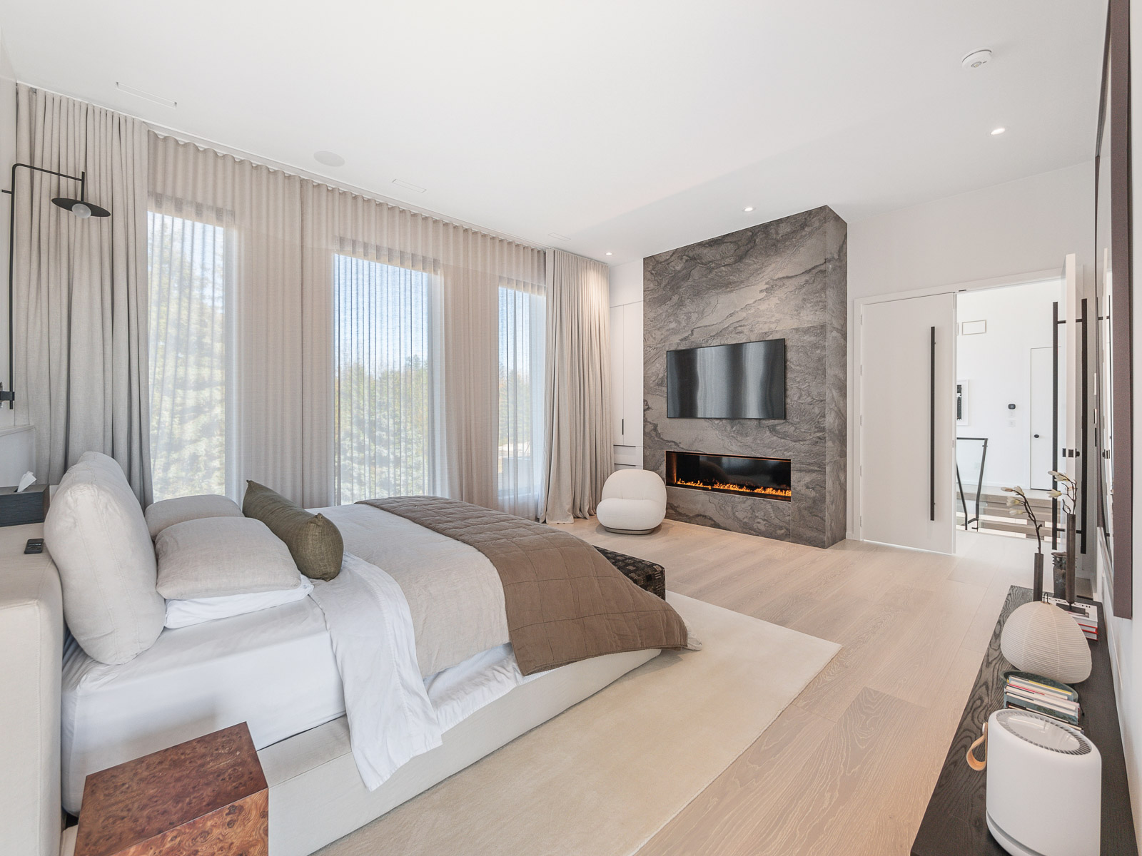modern-luxury-markham-home-for-sale-cachet-primary-bedroom-gas-fireplace
